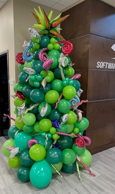 Balloon Christmas tree with tropical and candy accents