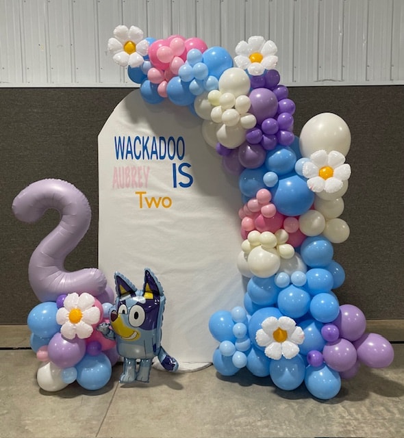Wackadoo Is Two — Bluey balloon garland with daisy accents