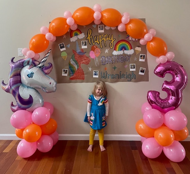 Unicorn 3rd birthday balloon arch with number 3